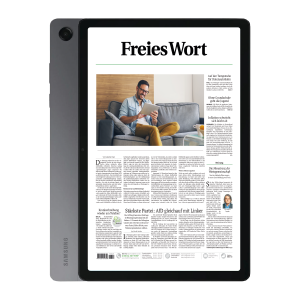 Tablet in a protective case displaying the Freies Wort front page, with a man on a sofa reading on a tablet in the layout window